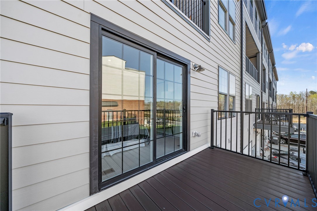 13129 Brattice Loop Midlothian, VA 23114 - Photo 20 of 41 a view of a balcony with wooden floor