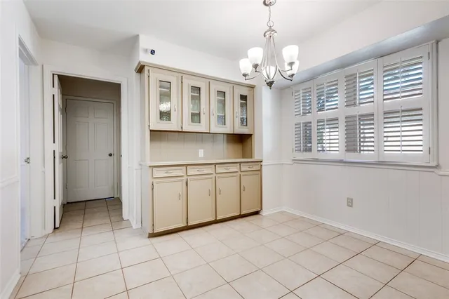 a kitchen with a stove a sink and dishwasher