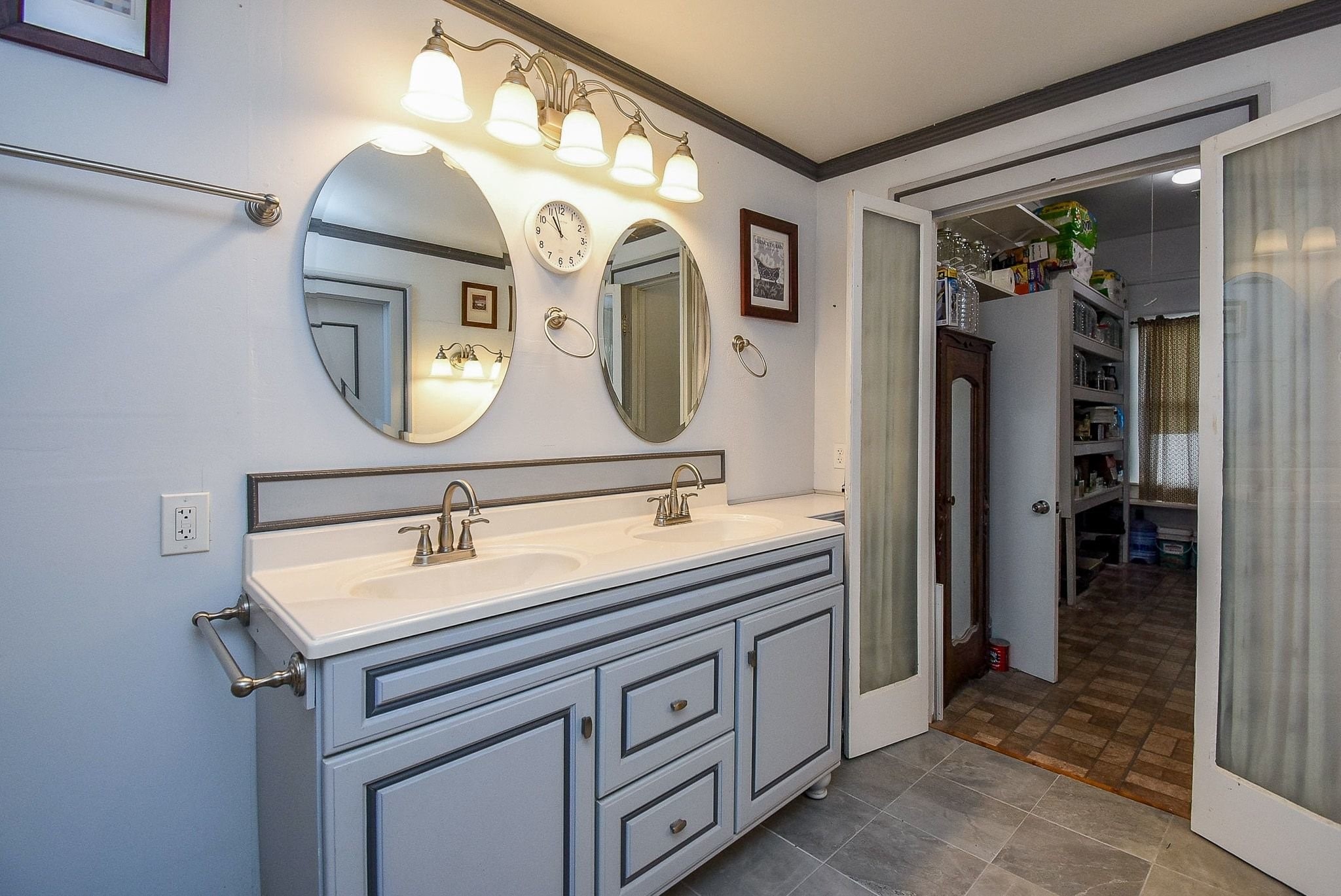 807 Clipson Road Eagle Lake, TX 77434 - Photo 20 of 31 a bathroom with a sink and a mirror