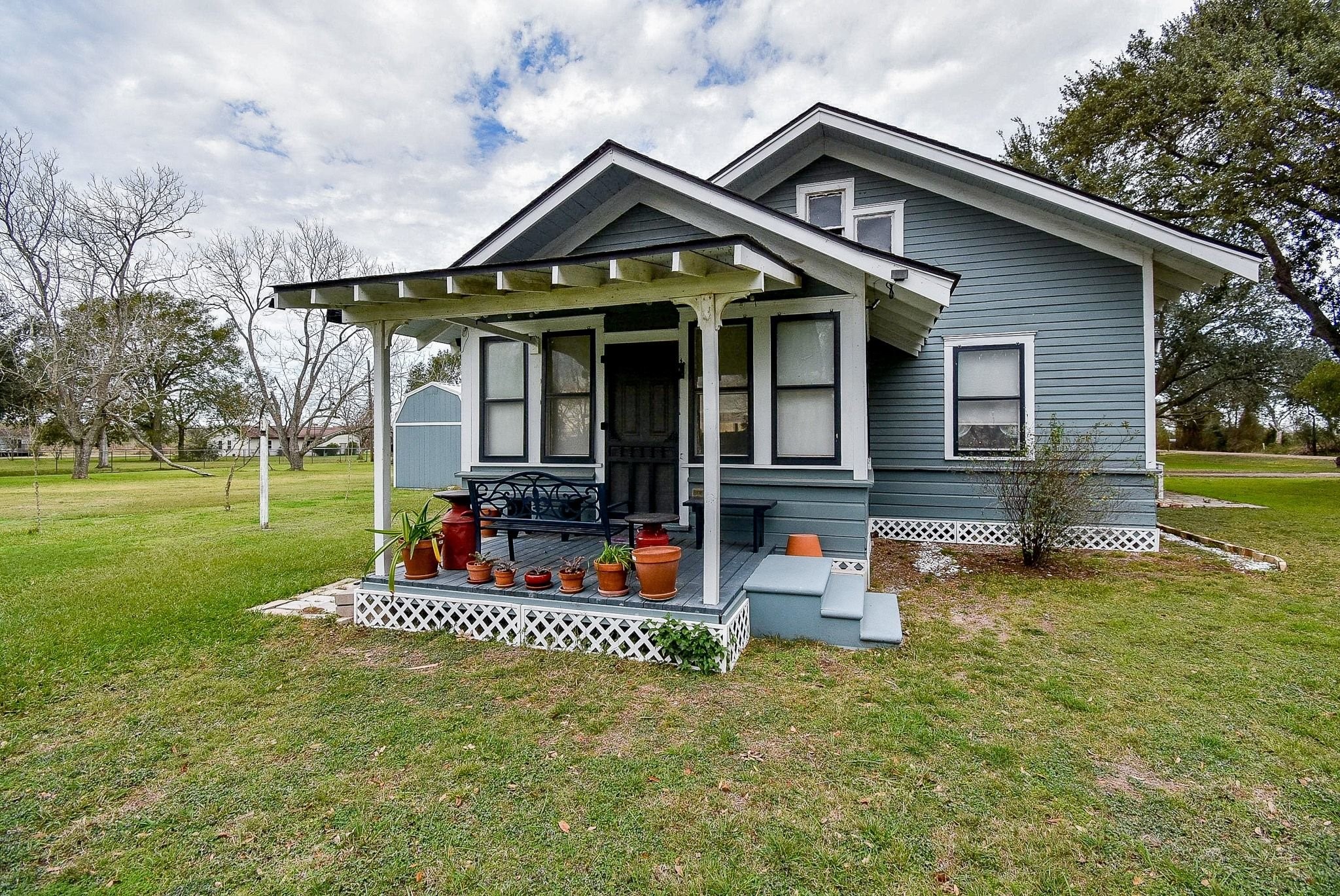 807 Clipson Road Eagle Lake, TX 77434 - Photo 25 of 31 a front view of a house with garden