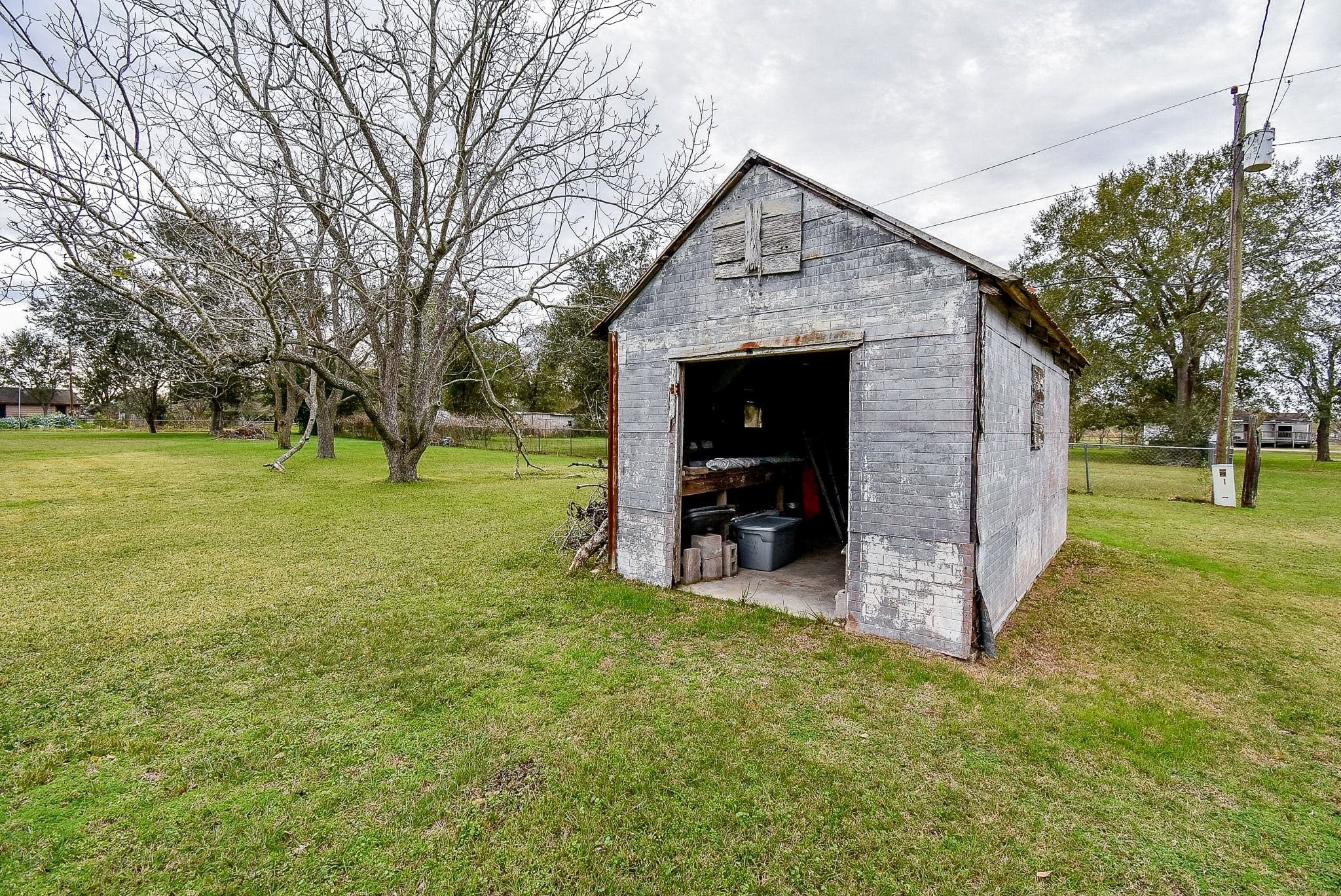 807 Clipson Road Eagle Lake, TX 77434 - Photo 28 of 31 a front view of a house with garden