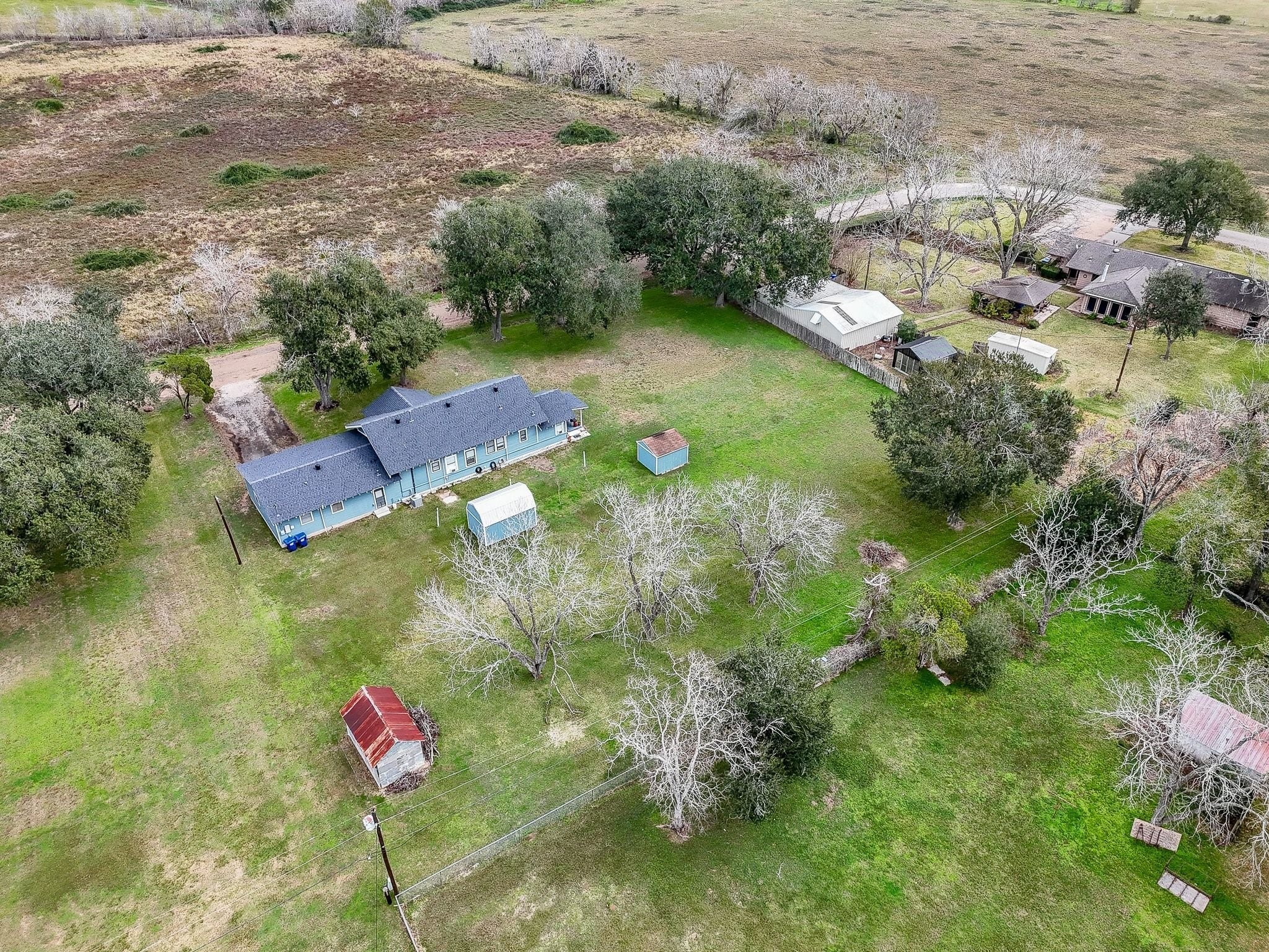 807 Clipson Road Eagle Lake, TX 77434 - Photo 29 of 31 an aerial view of residential house with outdoor space