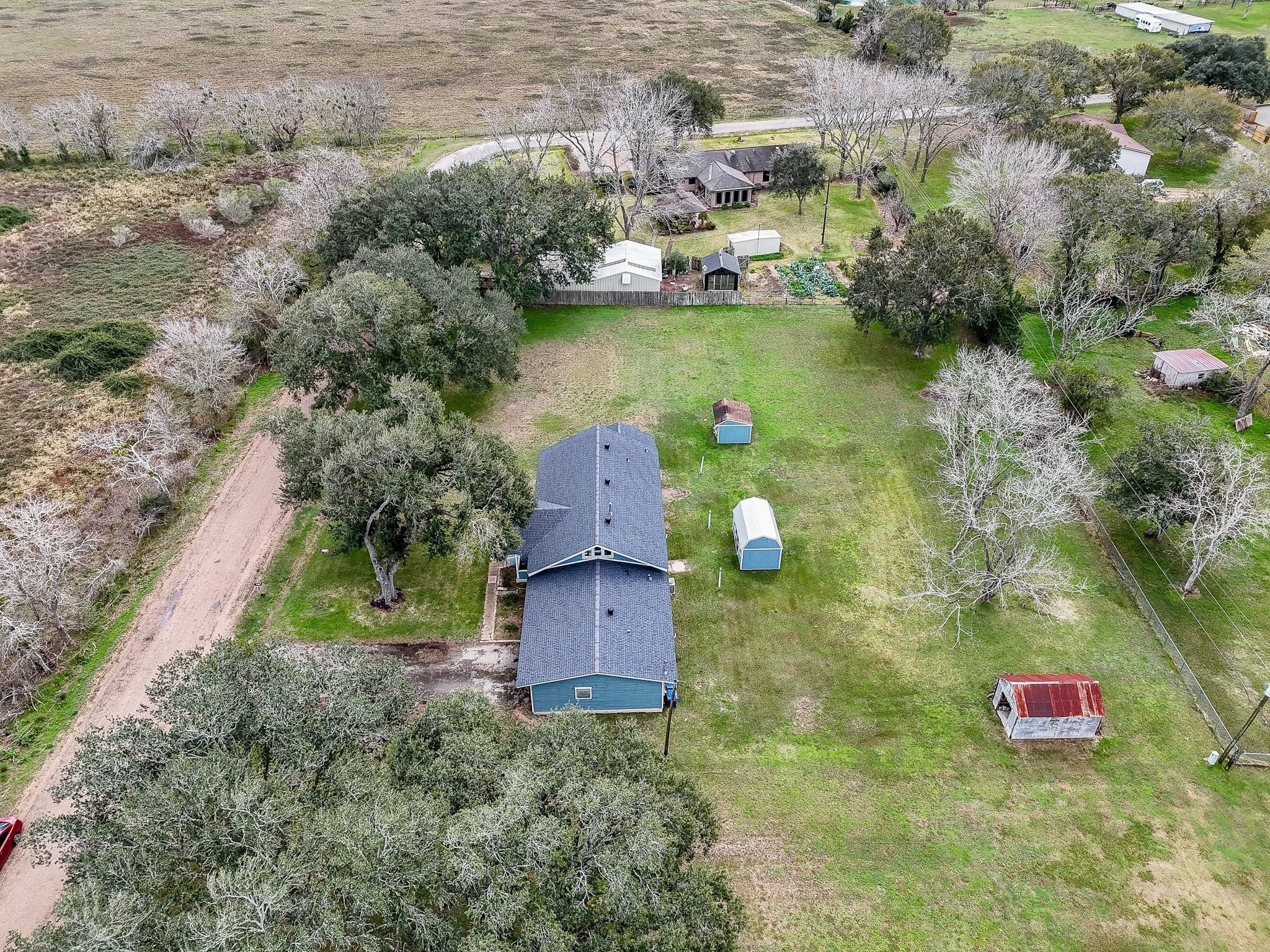 807 Clipson Road Eagle Lake, TX 77434 - Photo 31 of 31 an aerial view of residential house with outdoor space