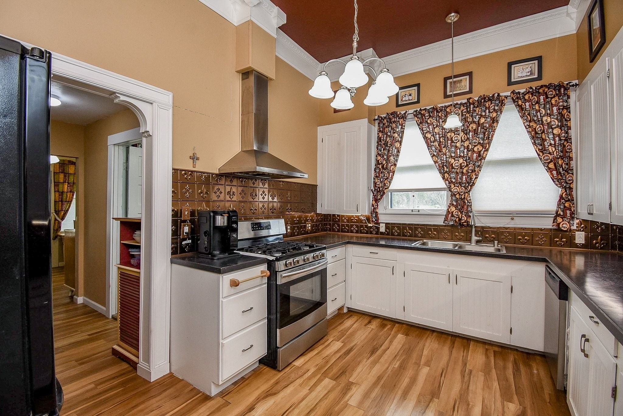 807 Clipson Road Eagle Lake, TX 77434 - Photo 10 of 31 a kitchen with stainless steel appliances granite countertop a stove and a sink
