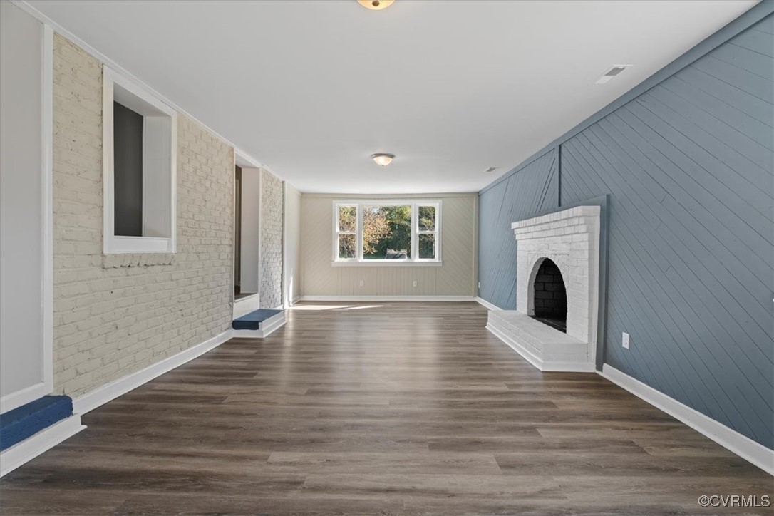 4709 Three Chopt Road Louisa, VA 23093 - Photo 13 of 49 Unfurnished living room featuring a brick fireplac