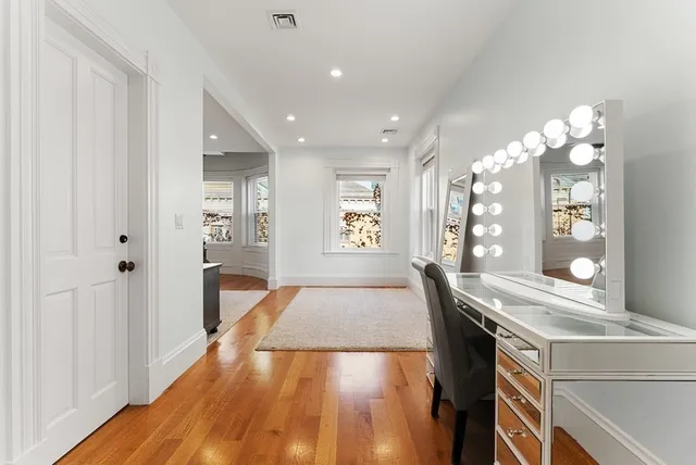 a view of a living room and dining room