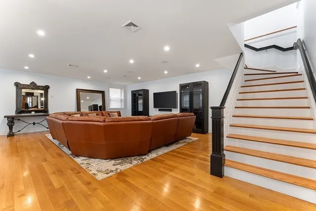 a living room with a couch and a couch