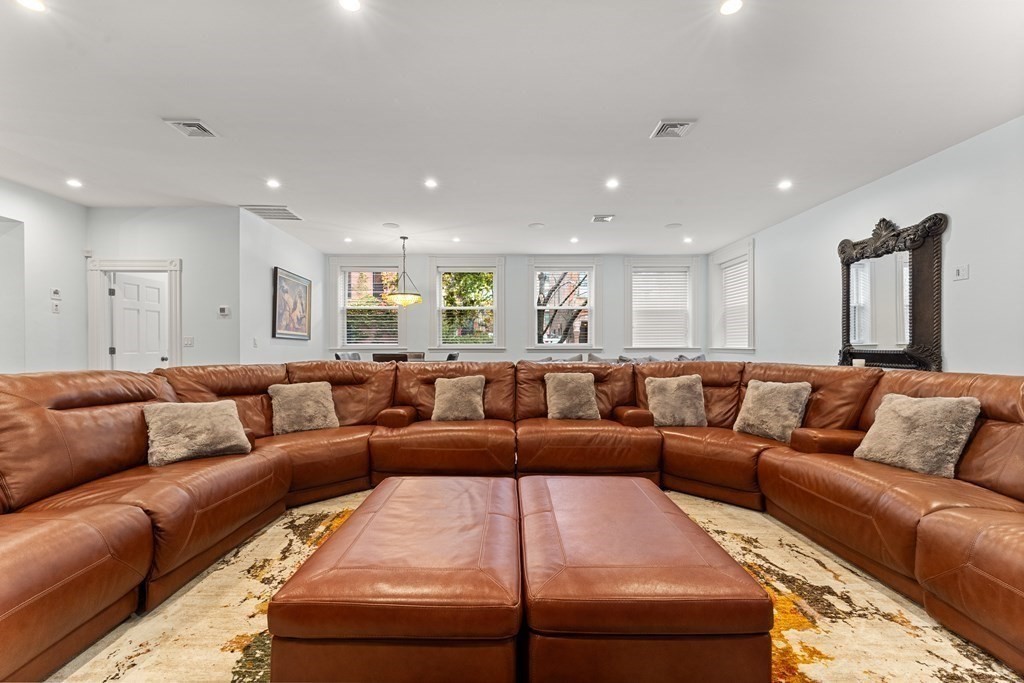 136 St Botolph Street Boston, MA 02115 - Photo 26 of 40 a living room with a couch and a couch