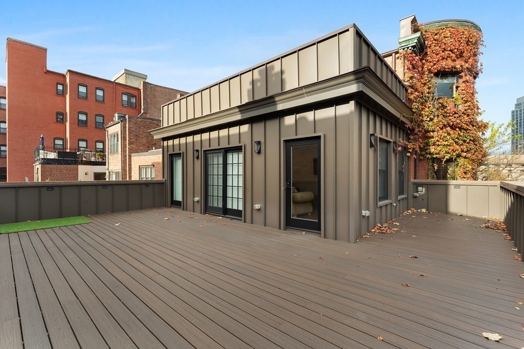 136 St Botolph Street Boston, MA 02115 - Photo 34 of 40 a view of a house with a deck