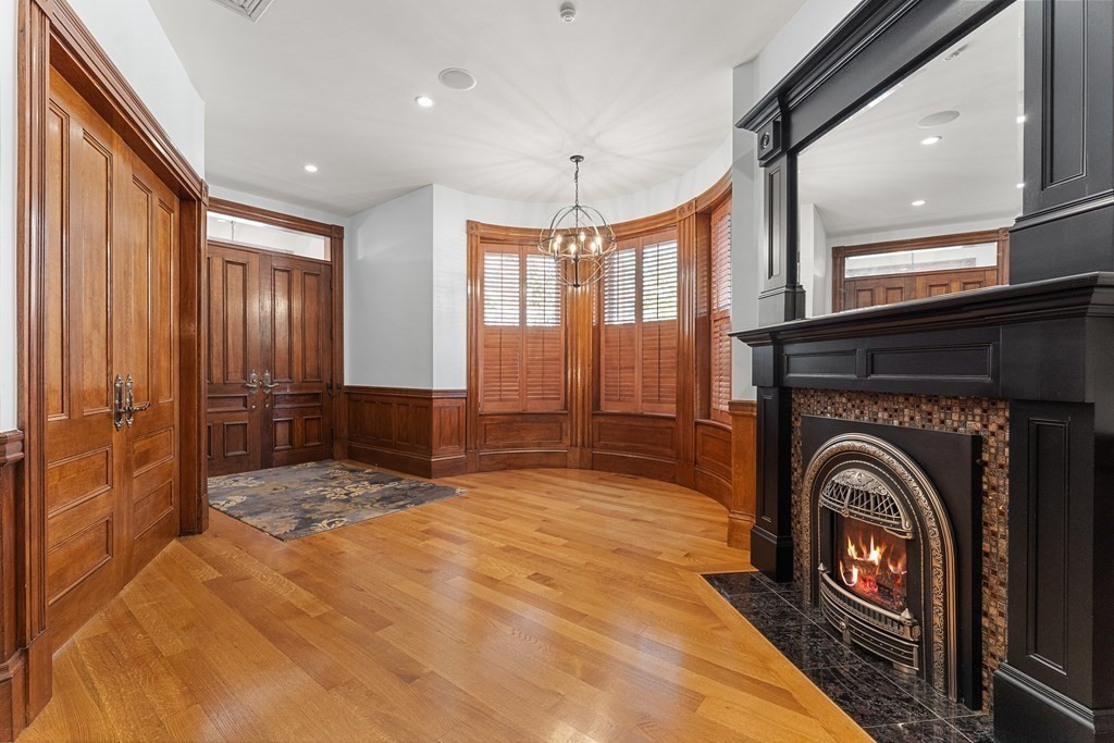 136 St Botolph Street Boston, MA 02115 - Photo 36 of 40 a view of a hallway with washer and dryer