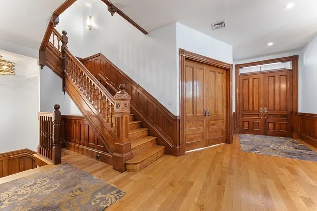 a view of an empty room with furniture