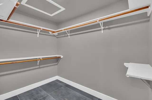 a view of a room with racks on the wall