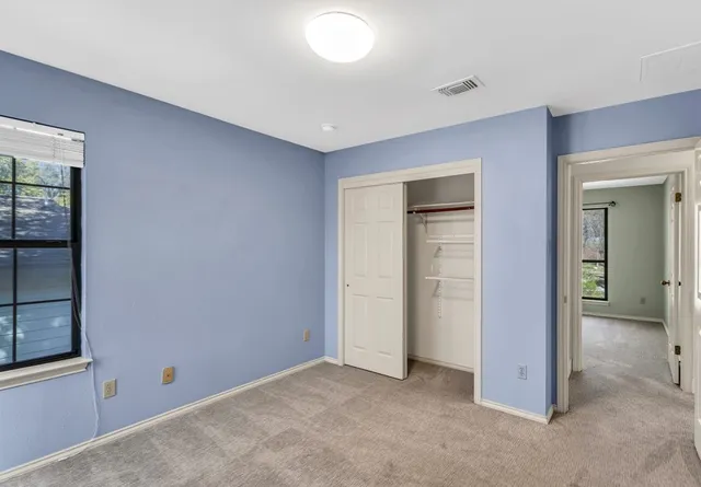 an empty room with closet