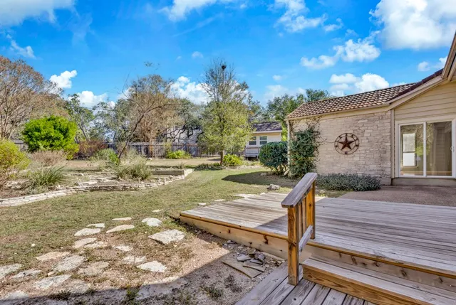 a view of a backyard with a garden