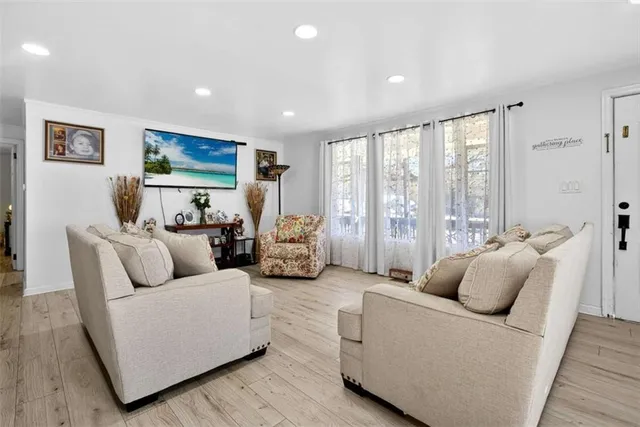 a living room with furniture and a couch