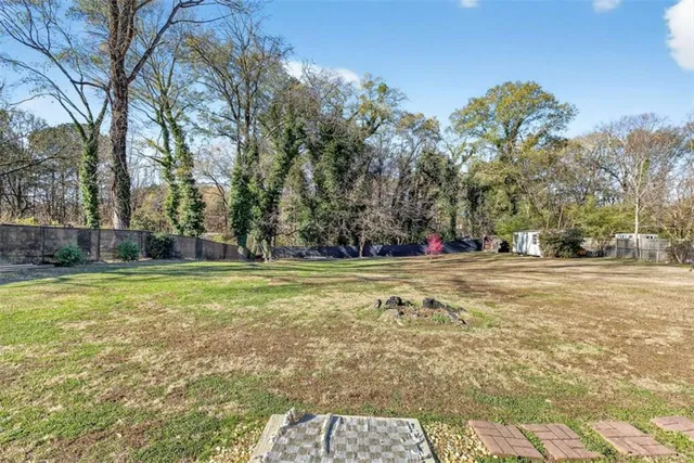 a swimming pool with wooden fence
