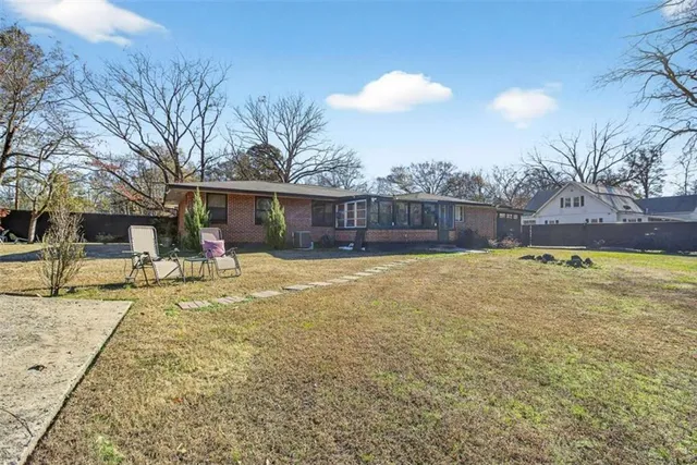a view of a swimming pool with an outdoor space