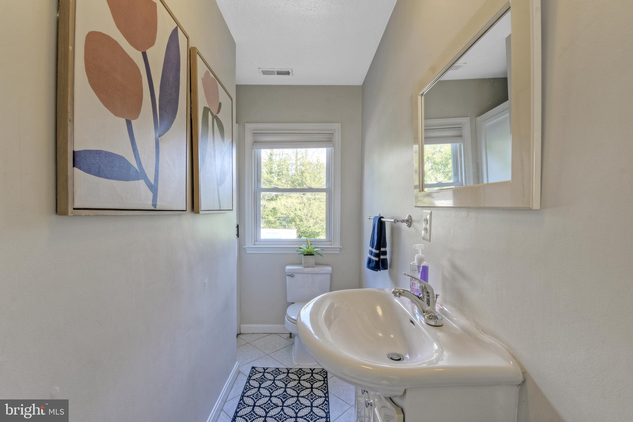418 Range Road Baltimore, MD 21204 - Photo 32 of 39 Combination Powder Room & Laundry