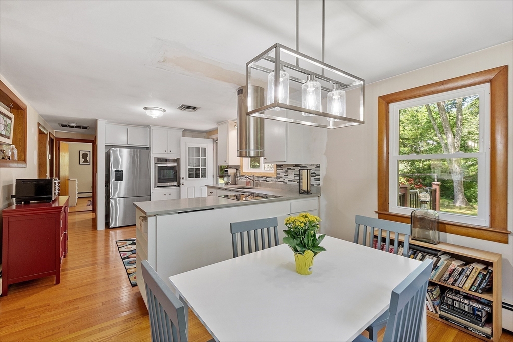275 Cordaville Road Ashland, MA 01721 - Photo 13 of 39 a view of a dining room with furniture and a window