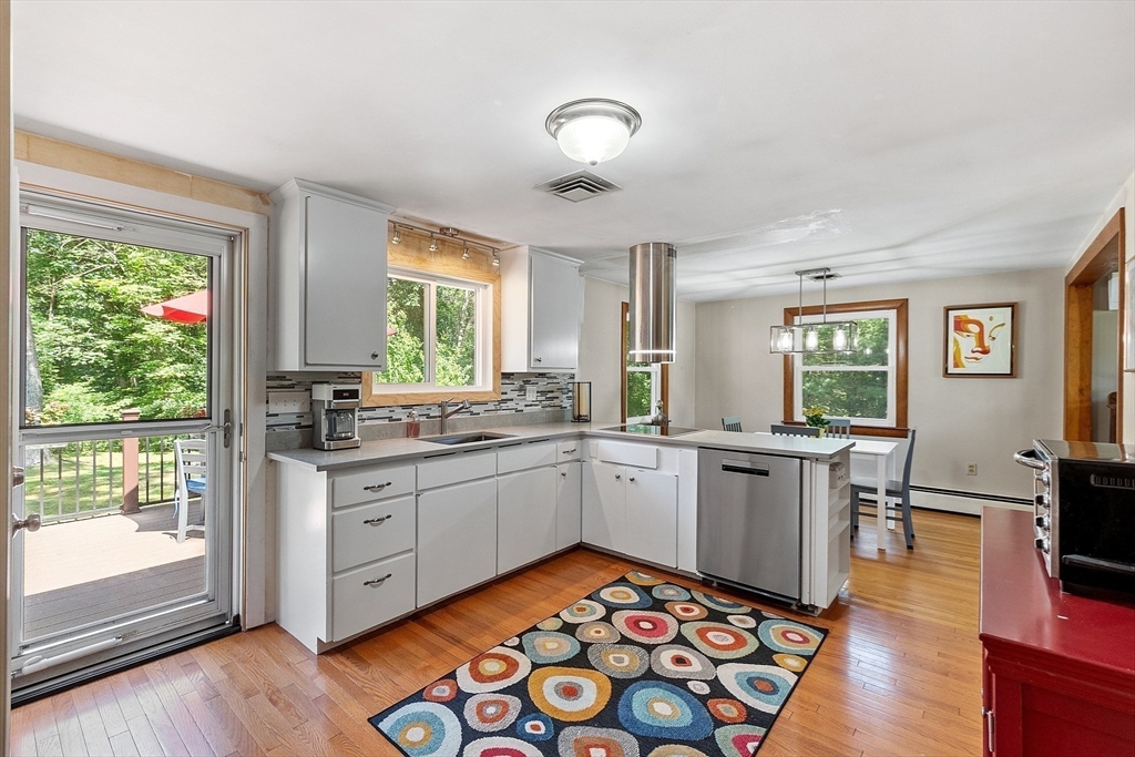 275 Cordaville Road Ashland, MA 01721 - Photo 16 of 39 a kitchen with sink stove and wooden floor