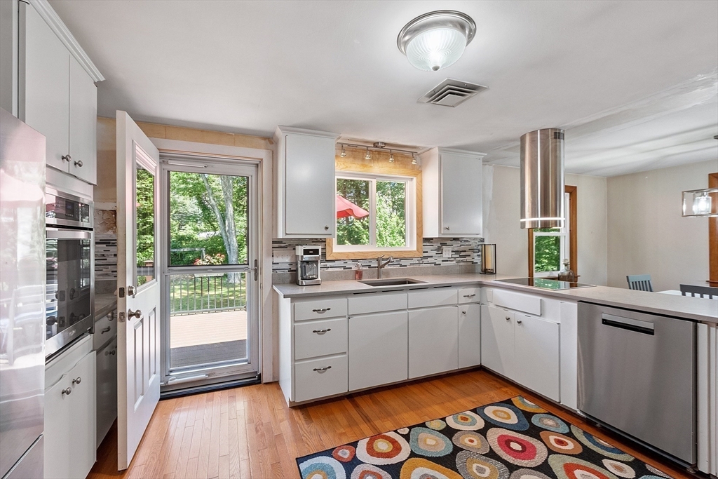 275 Cordaville Road Ashland, MA 01721 - Photo 17 of 39 a kitchen with sink window and cabinets