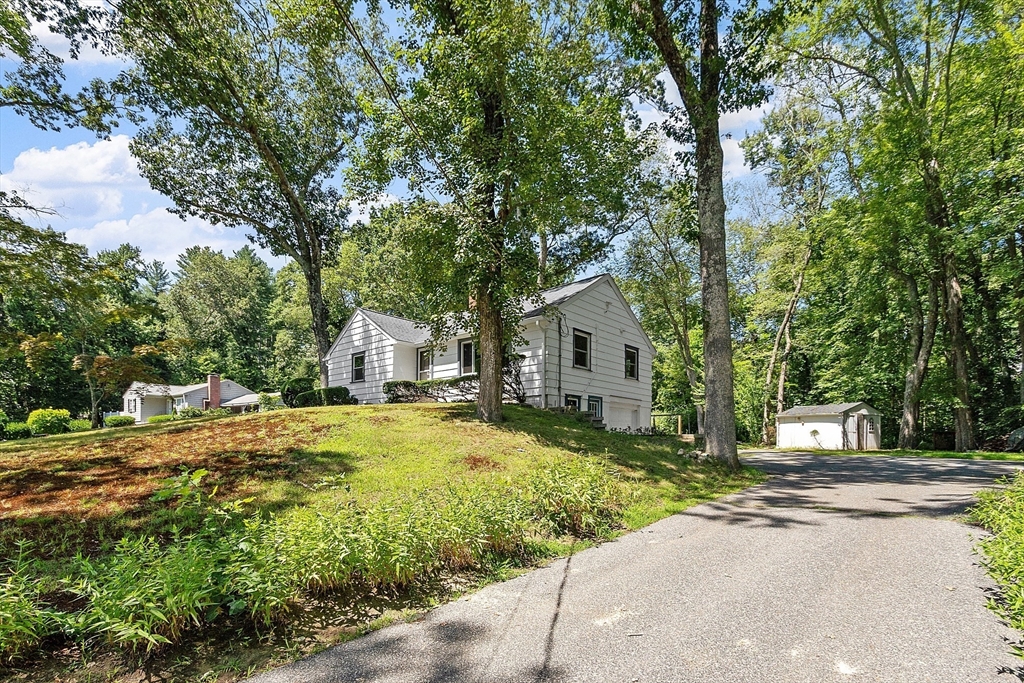 275 Cordaville Road Ashland, MA 01721 - Photo 2 of 39 a yellow house with trees in front of it