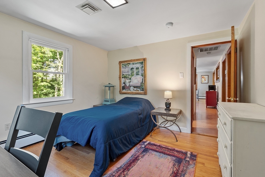 275 Cordaville Road Ashland, MA 01721 - Photo 26 of 39 a bedroom with a bed and a desk