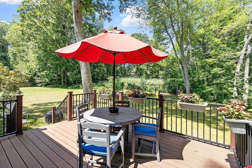275 Cordaville Road Ashland, MA 01721 - Photo 32 of 39 an outdoor space with furniture and umbrella
