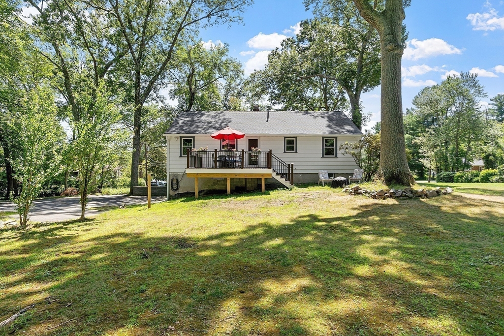 275 Cordaville Road Ashland, MA 01721 - Photo 33 of 39 a yellow house with swimming pool in front of it