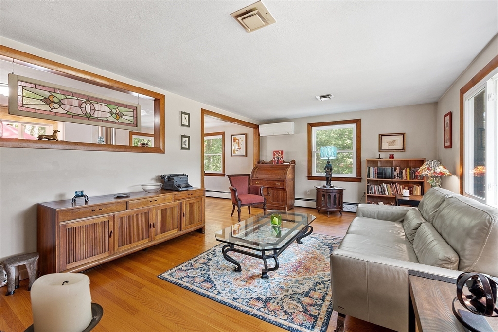 275 Cordaville Road Ashland, MA 01721 - Photo 6 of 39 a living room with furniture and wooden floor