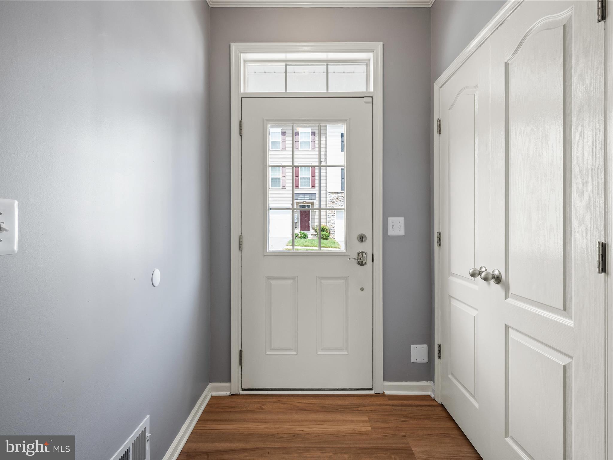247 Schramm Loop Stephens City, VA 22655 - Photo 2 of 34 a view of front door with wooden floor