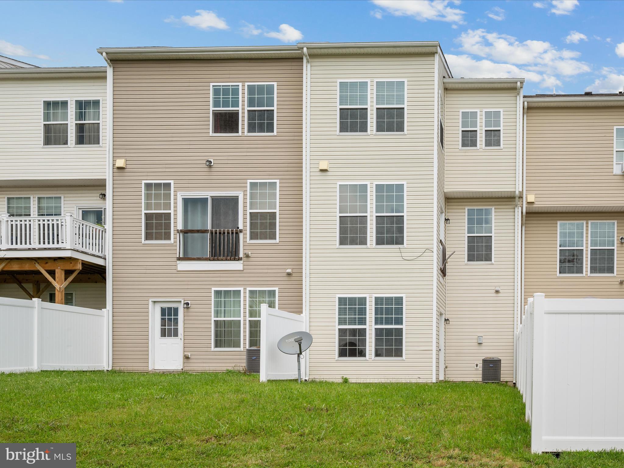 247 Schramm Loop Stephens City, VA 22655 - Photo 32 of 34 a large house with a yard in front of it