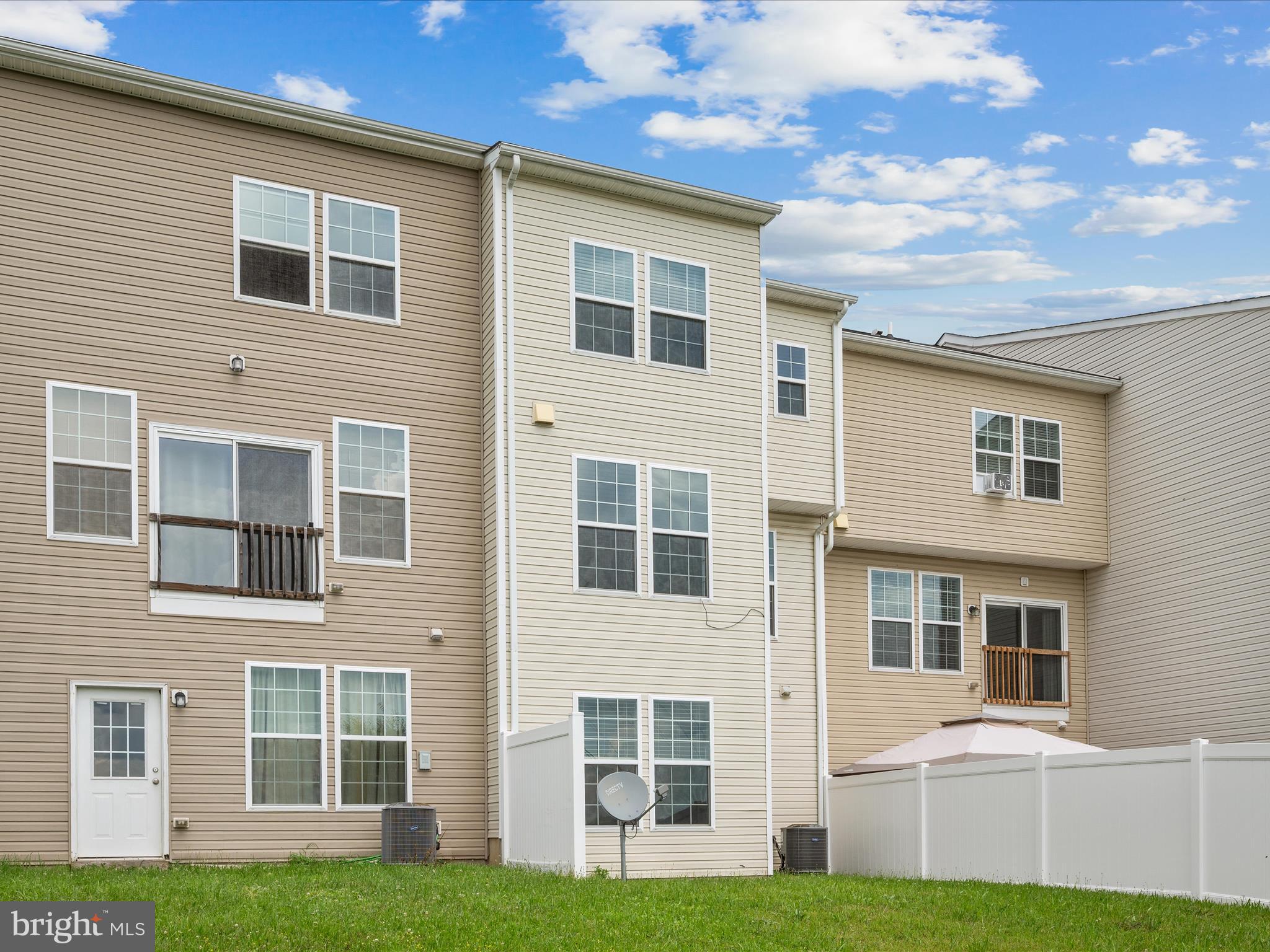 247 Schramm Loop Stephens City, VA 22655 - Photo 33 of 34 a front view of a house with a yard