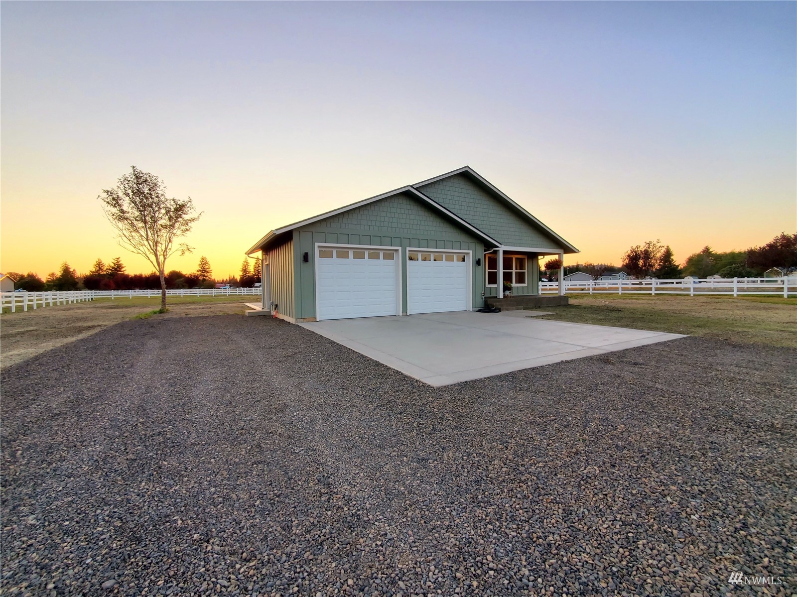 440 Merchants Road Forks, WA 98331 - Photo 2 of 27 a view of large house with a big yard and large trees