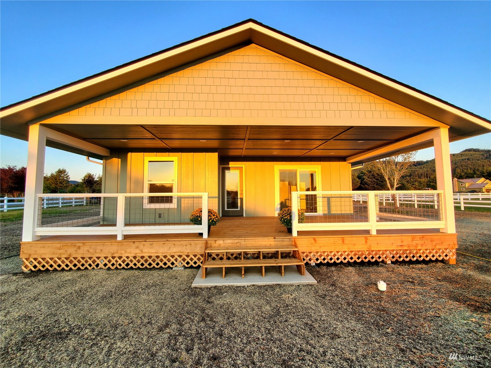 440 Merchants Road Forks, WA 98331 - Photo 27 of 27 a backyard with a table and chair