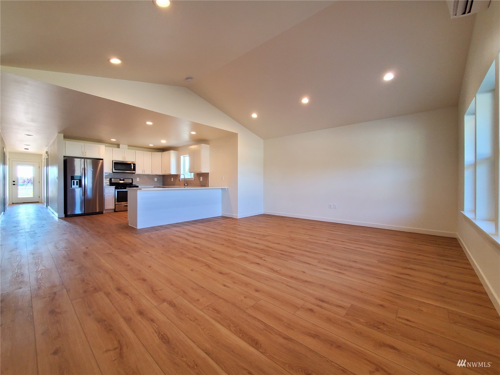 440 Merchants Road Forks, WA 98331 - Photo 3 of 27 a view of a kitchen with a sink and a large window