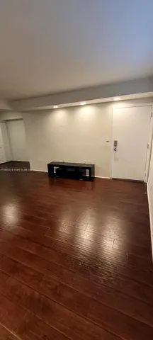 a view of room with hardwood floor