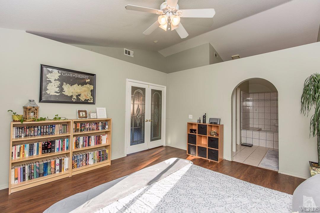 275 Ridgeton Lane, Unit B Simi Valley, CA 93065 - Photo 14 of 25 a view of living room with furniture and wooden floor