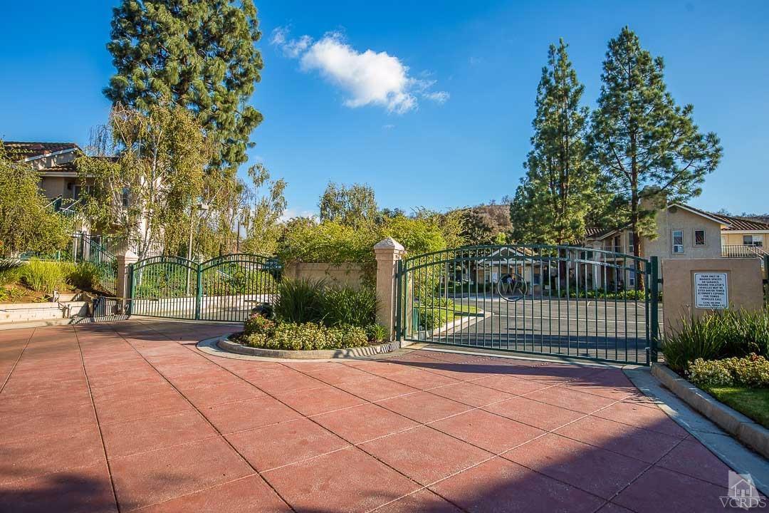 275 Ridgeton Lane, Unit B Simi Valley, CA 93065 - Photo 22 of 25 a view of a garden with a pathway