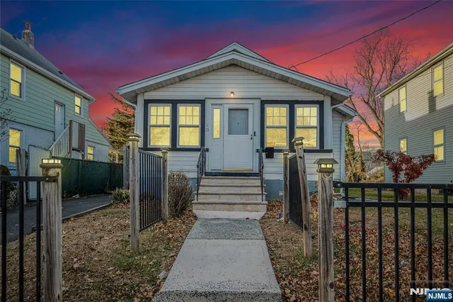 a front view of a house with a porch