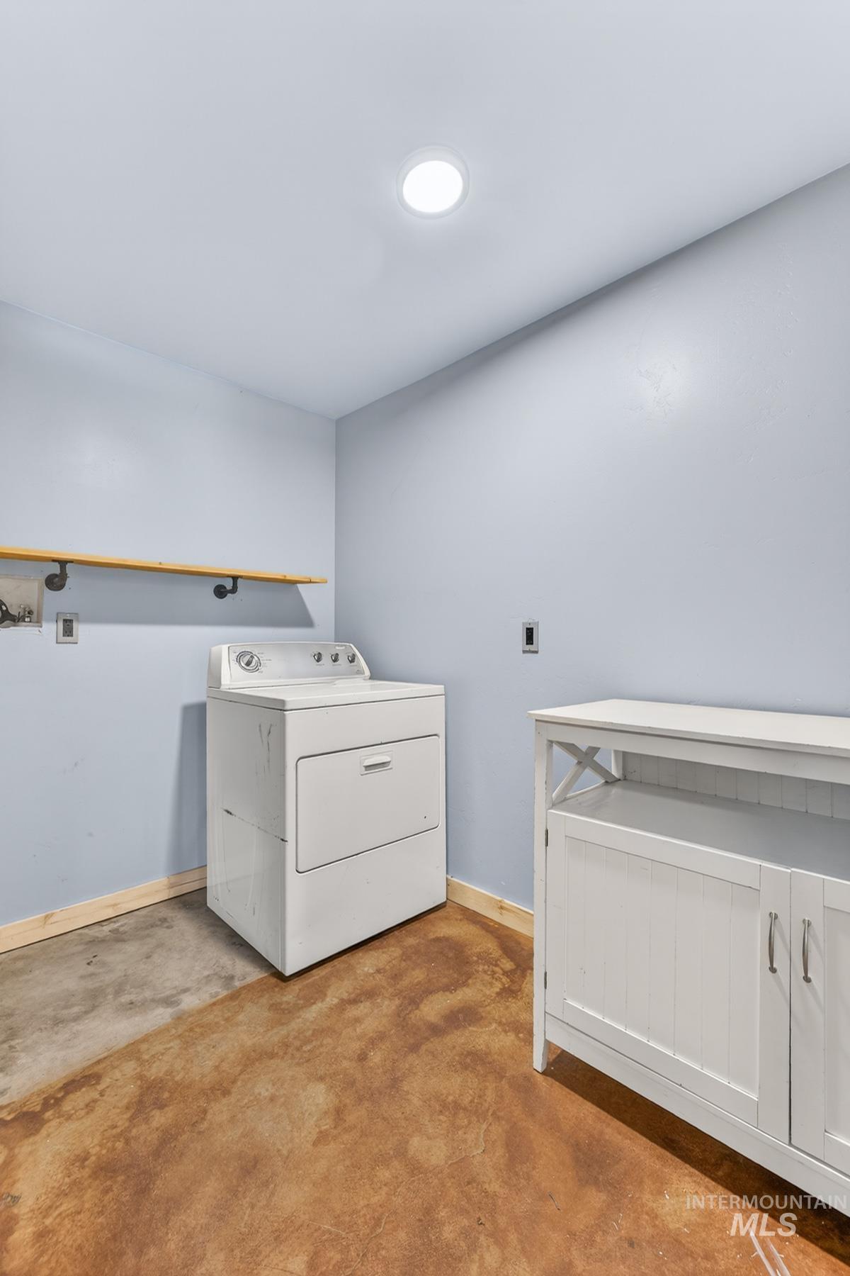 543 North Main Street Riggins, ID 83549 - Photo 32 of 46 Laundry room with washer / clothes dryer and concrete floors