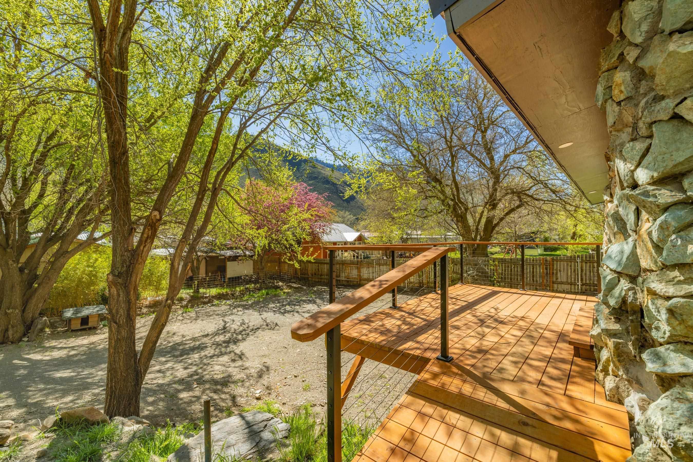 543 North Main Street Riggins, ID 83549 - Photo 4 of 46 Wooden terrace with a fenced backyard