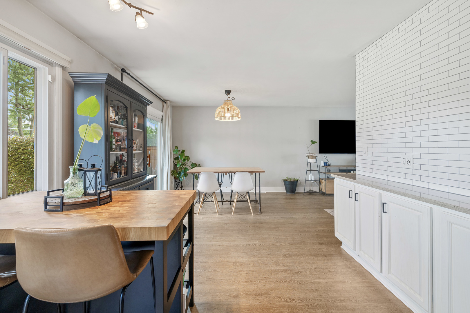 732 Sandy Lane Des Plaines, IL 60016 - Photo 4 of 17 a view of a dining room with furniture window and outside view