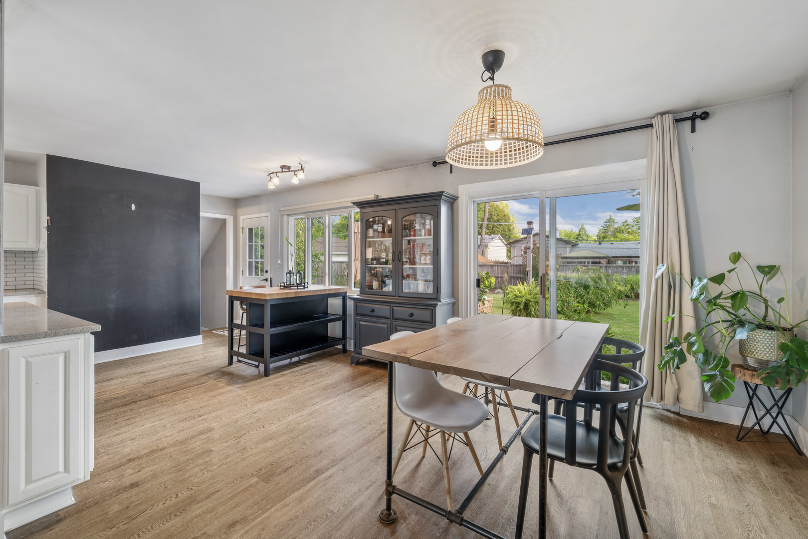 732 Sandy Lane Des Plaines, IL 60016 - Photo 5 of 17 a view of a dining room with furniture window and wooden floor