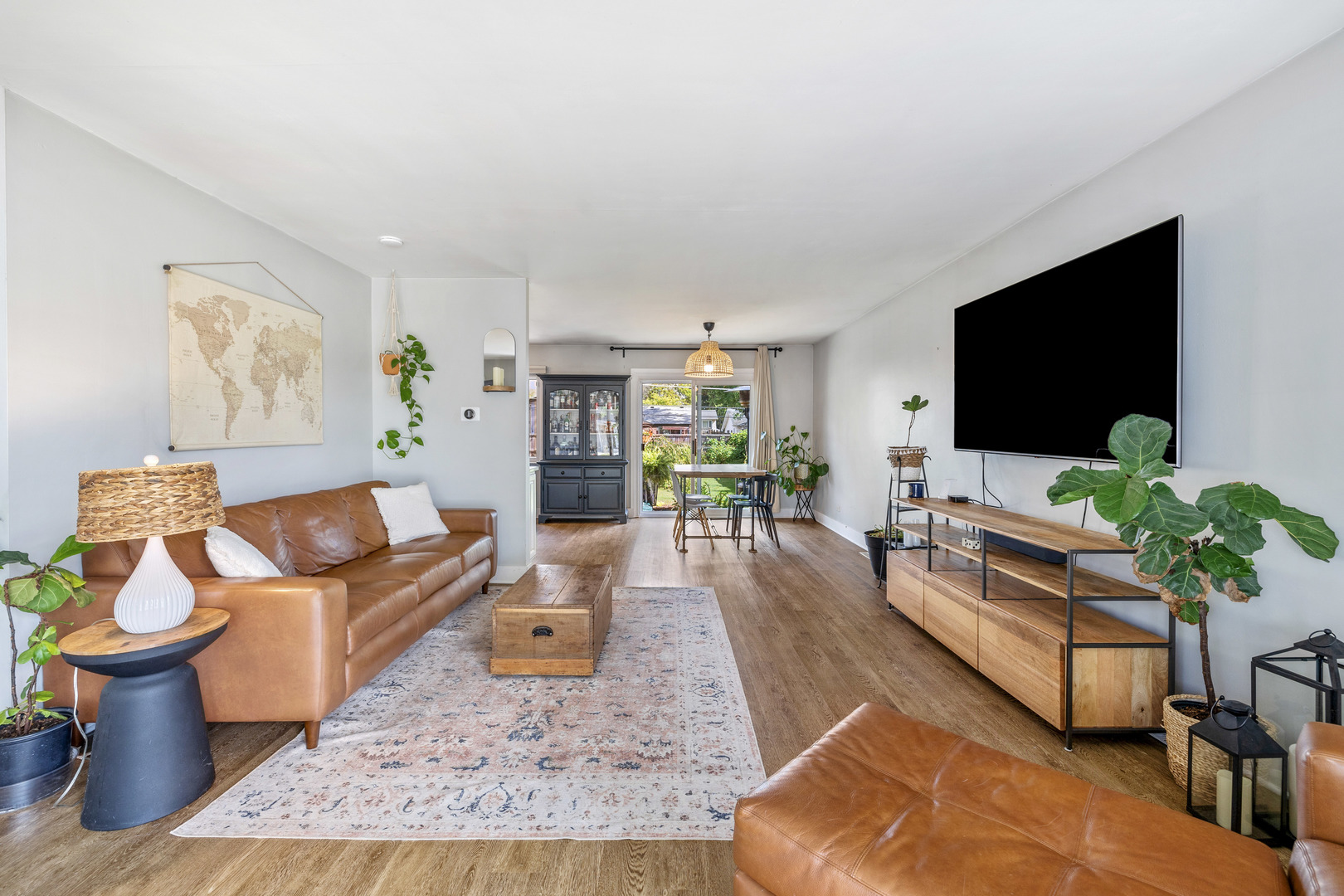 732 Sandy Lane Des Plaines, IL 60016 - Photo 7 of 17 a living room with furniture and a flat screen tv