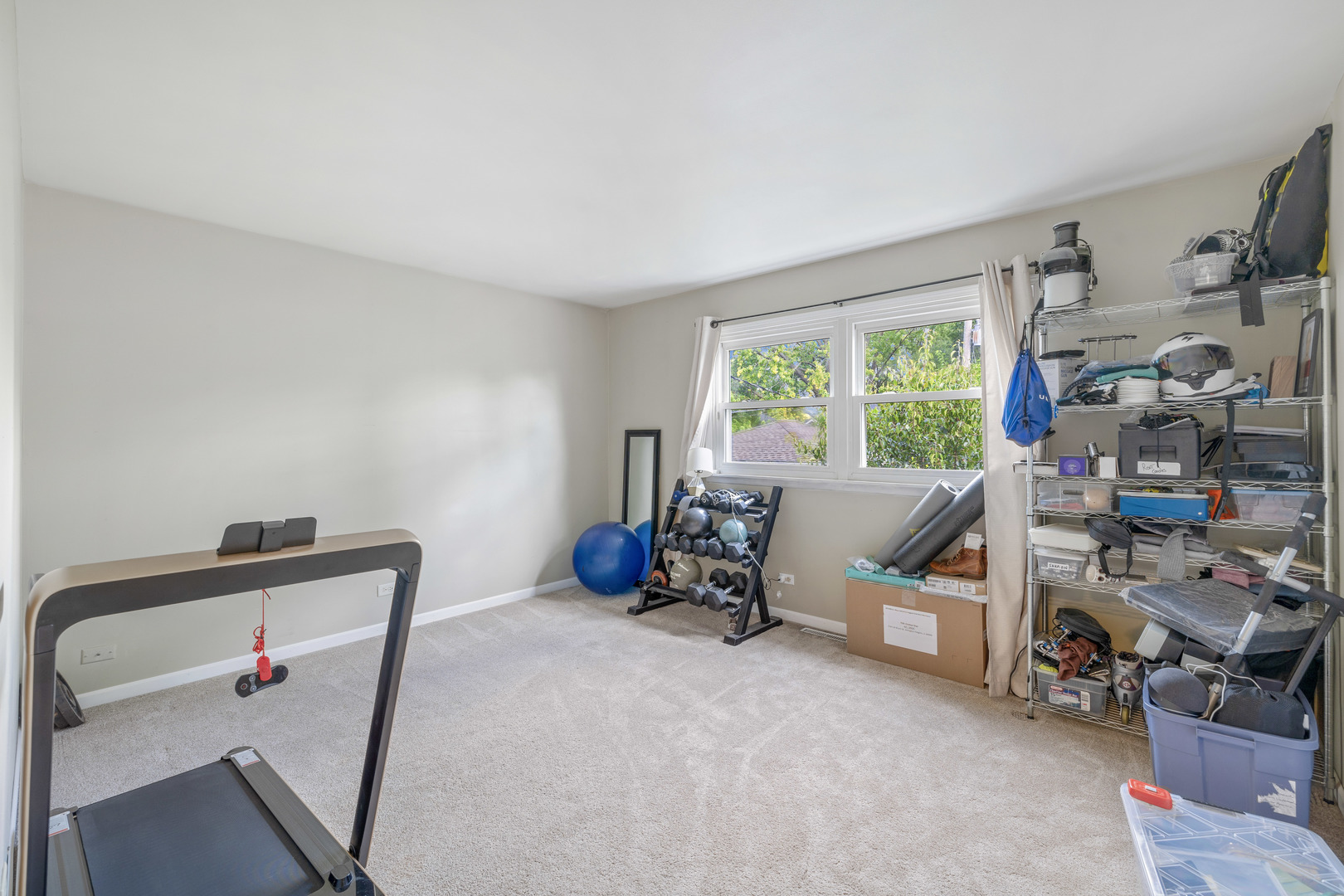 732 Sandy Lane Des Plaines, IL 60016 - Photo 9 of 17 a view of a room with toys and a window