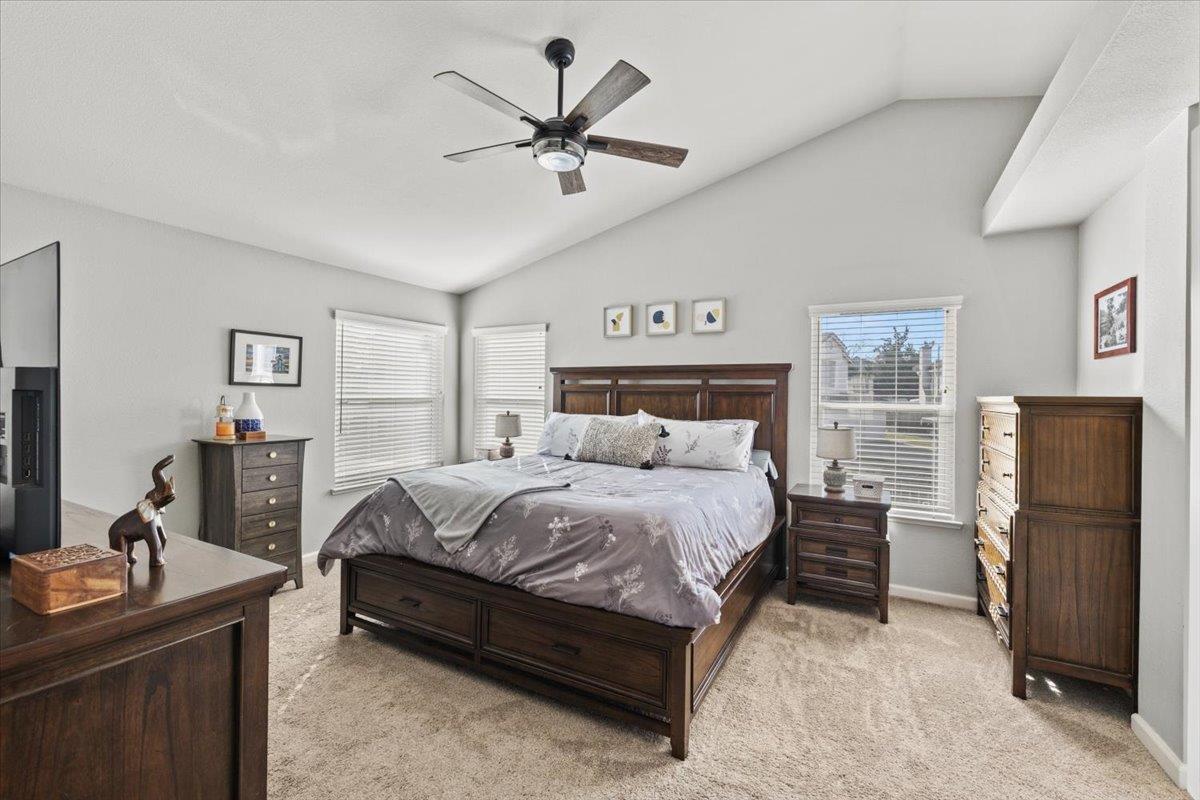 5303 Elgin Hills Way Antelope, CA 95843 - Photo 13 of 33 a bedroom with a bed furniture and a flat screen tv