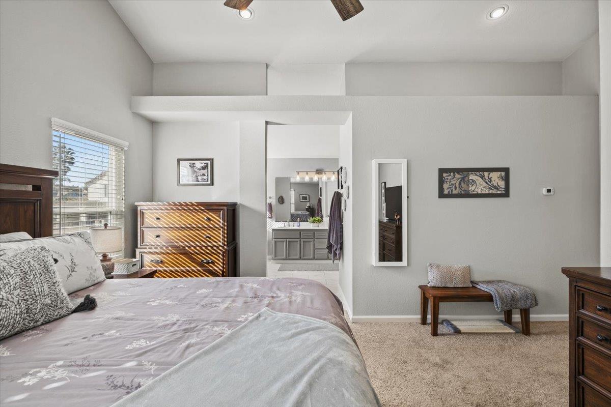 5303 Elgin Hills Way Antelope, CA 95843 - Photo 14 of 33 a bedroom with a bed and a chair