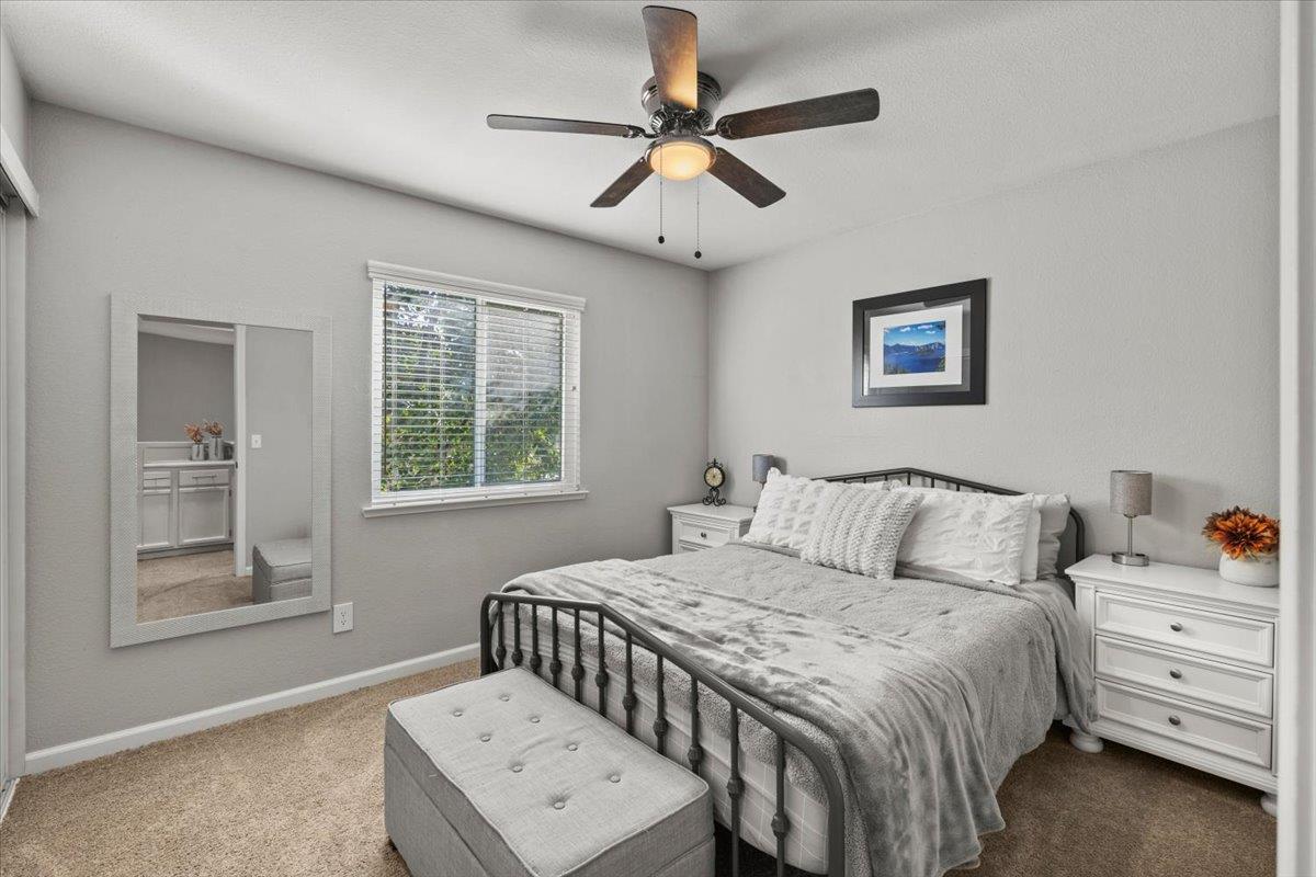 5303 Elgin Hills Way Antelope, CA 95843 - Photo 19 of 33 a bedroom with a bed and a window in it
