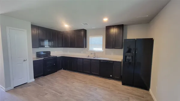 $1,500 | 15027 Sorrento Bay Court, Willis, TX 77318